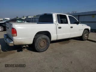 ✅ 2001 Dodge Dakota Sport • VIN: 1B7GL2AN61S106759 • Lot: 87423404. Wystawiony na Copart z przebiegiem 300 360 mil. Bezpłatny archiwum sprzedaży aukcyjnych z USA i szczegółowy raport historii pojazdu na DreamBid. Zdjęcie 3.