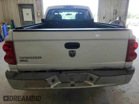 2006 Dodge Dakota SLT с VIN 1D7HW42K96S579208, выставлен на аукционе Copart как лот 71699414 с пробегом 178 506 миль миль и Чистый • Clean title. История ставок и продаж доступна на DreamBid. Изображение 6.