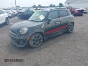 ✅ 2015 MINI Countryman S • VIN: WMWZC5C56FWP46166 • Lot: 42677454. Listed on IAAI with 91,369 mi. Free auction sales archive from the USA and detailed vehicle history report at DreamBid. Image 2.