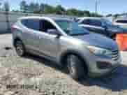 2015 Hyundai Santa Fe with VIN 5XYZT3LB4FG296155, listed as a Copart auction lot 57675435 with 70,209 mi miles and Salvage title. Bid and sale history available at DreamBid. Image 4.