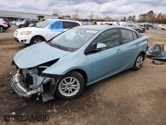 2018 Toyota Prius Two z VIN JTDKBRFU7J3058785, wystawiony jako Copart lot #90085795 z przebiegiem 83 292 mil mil oraz Szkoda całkowita • Salvage title. Historia ofert i sprzedaży dostępna na DreamBid. Obrazek 1.
