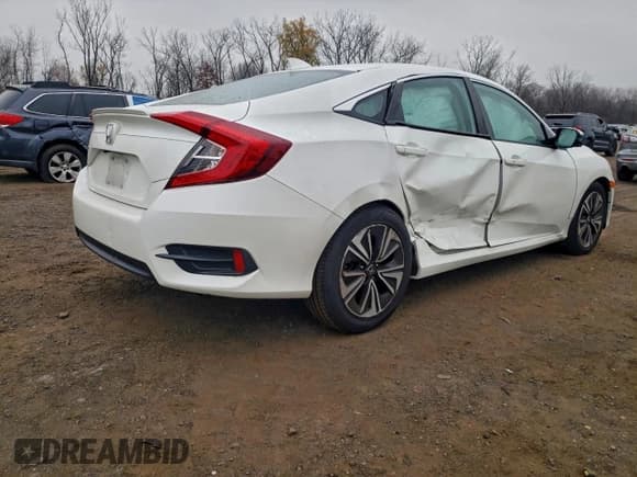 ✅ 2018 Honda Civic EX-T • VIN: 19XFC1F30JE200989 • Lot: 93400535. Listed on Copart with 161,906 mi. Free auction sales archive from the USA and detailed vehicle history report at DreamBid. Image 3.