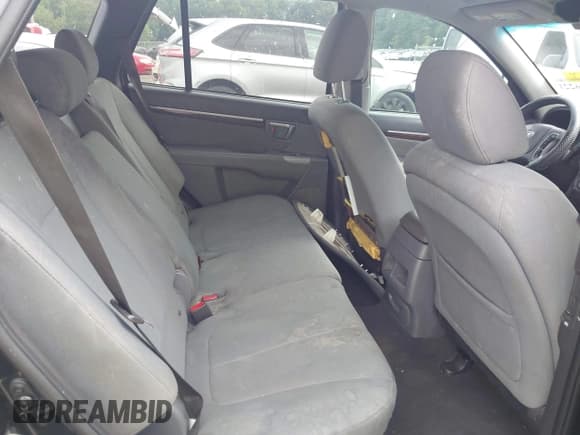 ✅ 2012 Hyundai Santa Fe GLS • VIN: 5XYZGDAG2CG144556 • Lot: 42596221. Listed on IAAI with 164,813 mi. Free auction sales archive from the USA and detailed vehicle history report at DreamBid. Image 8.