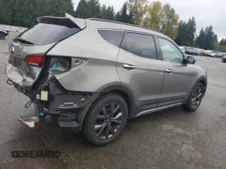 2017 Hyundai Santa Fe Ultimate z VIN 5XYZWDLA3HG485502, wystawiony jako Copart lot #90261245 z przebiegiem 84 872 mil mil oraz Szkoda całkowita • Salvage title. Historia ofert i sprzedaży dostępna na DreamBid. Obrazek 3.