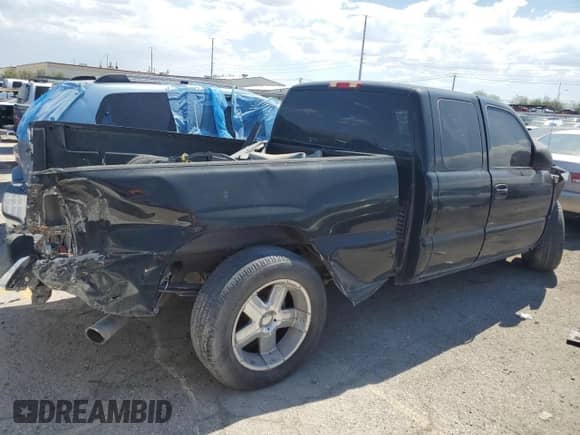 2002 Chevrolet Silverado 1500 with VIN 2GCEC19W121412302, listed as a Copart auction lot 55272472 with 204,099 mi miles and Salvage title. Bid and sale history available at DreamBid. Image 4.