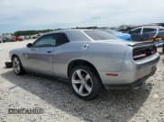 ✅ 2016 Dodge Challenger R/T • VIN: 2C3CDZBT5GH256271 • Lot: 46797214. Wystawiony na Copart z przebiegiem 131 349 mil. Bezpłatny archiwum sprzedaży aukcyjnych z USA i szczegółowy raport historii pojazdu na DreamBid. Zdjęcie 2.