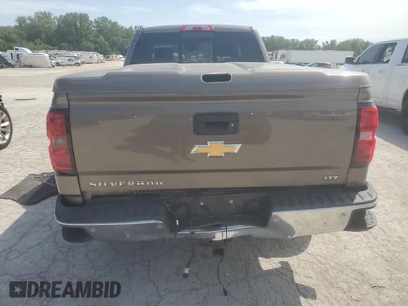 2014 Chevrolet Silverado 1500 LTZ with VIN 3GCUKSEC2EG128866, listed as a Copart auction lot 67001695 with 186,402 mi miles and Salvage title. Bid and sale history available at DreamBid. Image 6.