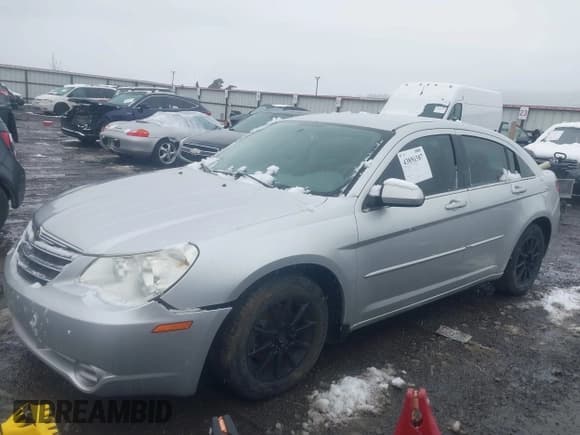 ✅ 2007 Chrysler Sebring • VIN: 1C3LC46R77N551660 • Lot: 43858387. Listed on IAAI with 198,657 mi. Free auction sales archive from the USA and detailed vehicle history report at DreamBid. Image 2.
