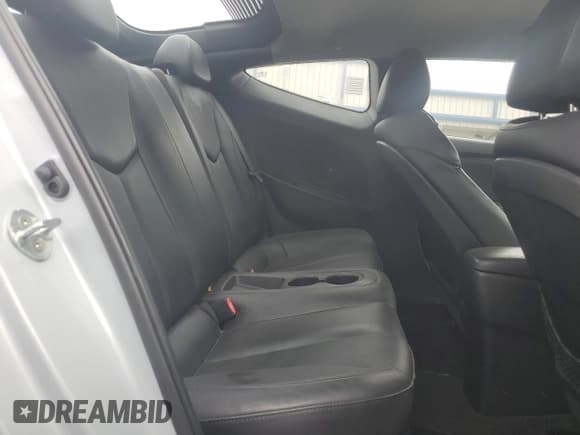 ✅ 2014 Hyundai Veloster • VIN: KMHTC6AD6EU213698 • Lot: 78961304. Wystawiony na Copart z przebiegiem 150 864 mil. Bezpłatny archiwum sprzedaży aukcyjnych z USA i szczegółowy raport historii pojazdu na DreamBid. Zdjęcie 10.