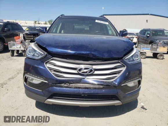 ✅ 2018 Hyundai Santa Fe 2.4L • VIN: 5XYZU3LBXJG505422 • Лот: 52761404. Опубликован ранее на Copart с пробегом 107 022 миль. Бесплатный доступ к архиву аукционных продаж из США и подробный отчёт об истории автомобиля на DreamBid. Изображение 5.