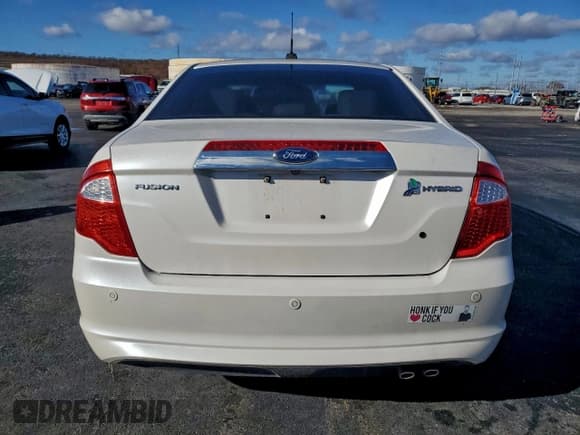 ✅ 2012 Ford Fusion Hybrid • VIN: 3FADP0L39CR237499 • Лот: 93891895. Опубликован ранее на Copart с пробегом 144 131 миль. Бесплатный доступ к архиву аукционных продаж из США и подробный отчёт об истории автомобиля на DreamBid. Изображение 6.