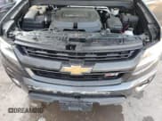 ✅ 2015 Chevrolet Colorado 4WD Z71 • VIN: 1GCGTCE32F1268285 • Лот: 70368764. Опубликован ранее на Copart с пробегом 38 911 миль. Бесплатный доступ к архиву аукционных продаж из США и подробный отчёт об истории автомобиля на DreamBid. Изображение 11.