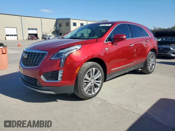 ✅ 2024 Cadillac XT5 FWD Premium Luxury • VIN: 1GYKNCR47RZ732971 • Lot: 82746715. Listed on Copart with 14,846 mi. Free auction sales archive from the USA and detailed vehicle history report at DreamBid. Image 1.