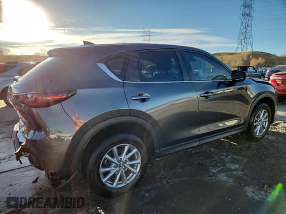 ✅ 2022 Mazda CX-5 S Carbon Edition • VIN: JM3KFBCM2N0587463 • Lot: 91115255. Listed on Copart with 48,302 mi. Free auction sales archive from the USA and detailed vehicle history report at DreamBid. Image 3.