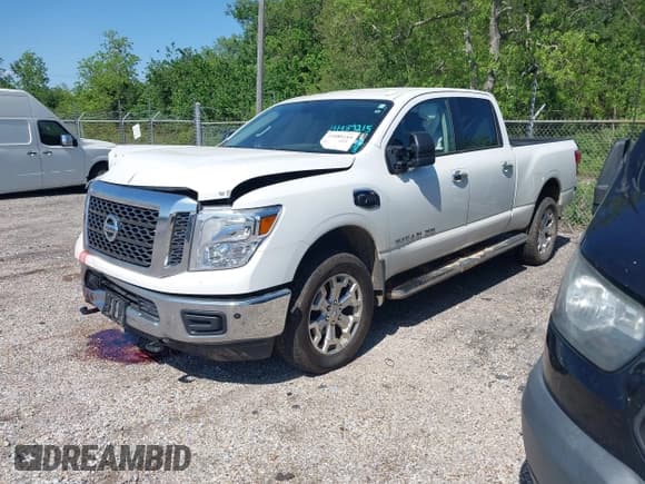✅ 2018 Nissan Titan SV • VIN: 1N6BA1F46JN526690 • Lot: 41989215. Listed on IAAI with 129,626 mi. Free auction sales archive from the USA and detailed vehicle history report at DreamBid. Image 2.