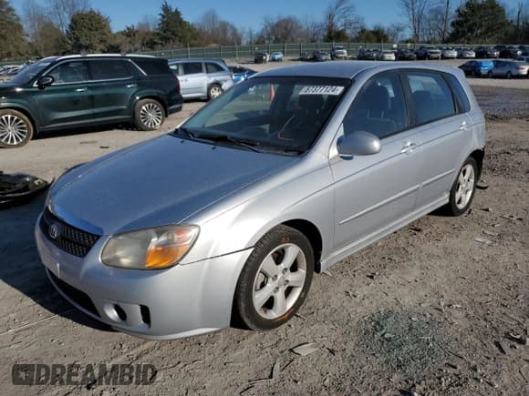 ✅ 2007 Kia Spectra • VIN: KNAFE161375004104 • Lot: 87377124. Listed on Copart with 241,076 mi. Free auction sales archive from the USA and detailed vehicle history report at DreamBid. Image 1.