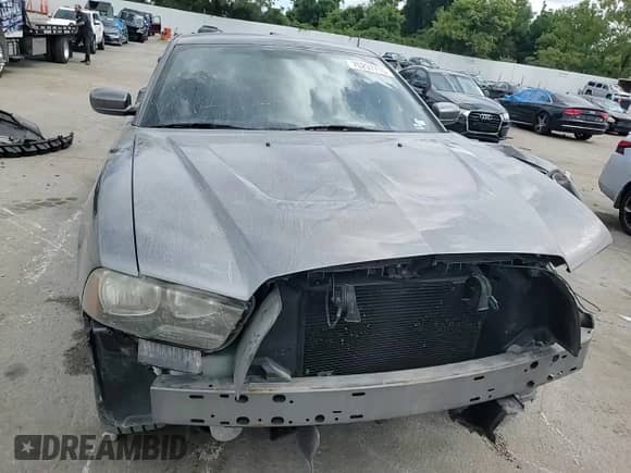 2012 Dodge Charger SXT с VIN 2C3CDXHG6CH126234, выставлен на аукционе Copart как лот 70297715 с пробегом 142 644 миль миль и Списание • Salvage title. История ставок и продаж доступна на DreamBid. Изображение 13.