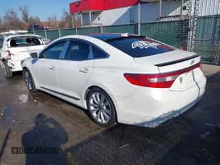2016 Hyundai Azera Limited z VIN KMHFH4JG7GA536630, wystawiony jako IAAI lot #41444129 z przebiegiem 128 309 mil mil oraz . Historia ofert i sprzedaży dostępna na DreamBid. Obrazek 3.