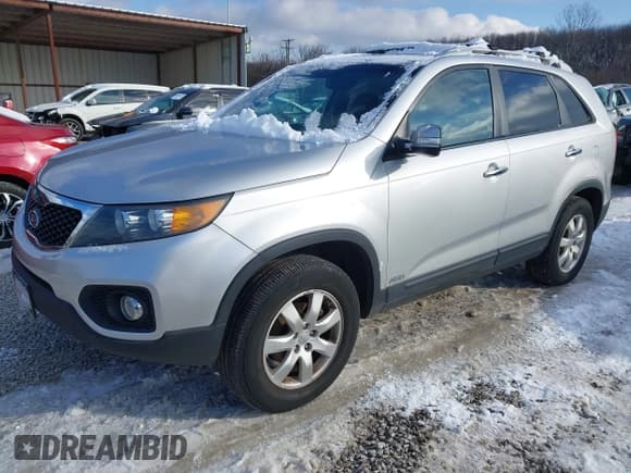 ✅ 2012 Kia Sorento LX • VIN: 5XYKTCA6XCG246816 • Lot: 43864686. Listed on IAAI with 112,000 mi. Free auction sales archive from the USA and detailed vehicle history report at DreamBid. Image 2.
