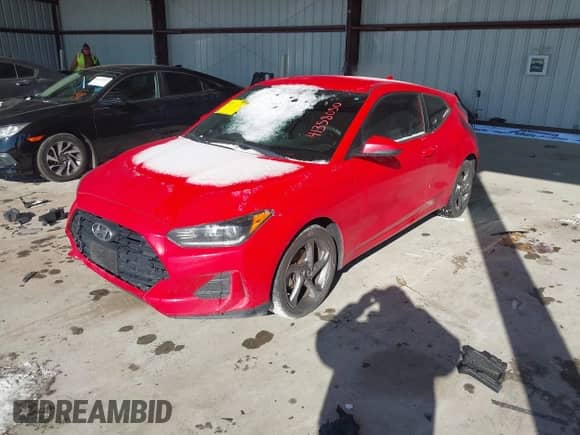 2019 Hyundai Veloster Premium with VIN KMHTG6AF6KU005242, listed as a IAAI auction lot 41358050 with 124,415 mi miles and . Bid and sale history available at DreamBid. Image 2.