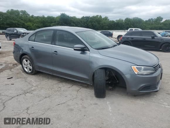 ✅ 2014 Volkswagen Jetta TDI w/Premium/Nav • VIN: 3VWLL7AJ1EM430822 • Лот: 57405845. Опубликован ранее на Copart с пробегом 112 178 миль. Бесплатный доступ к архиву аукционных продаж из США и подробный отчёт об истории автомобиля на DreamBid. Изображение 4.