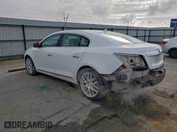 ✅ 2010 Buick LaCrosse CXS • VIN: 1G4GE5GV2AF180817 • Лот: 94906155. Опубликован ранее на Copart с пробегом 144 792 миль. Бесплатный доступ к архиву аукционных продаж из США и подробный отчёт об истории автомобиля на DreamBid. Изображение 2.