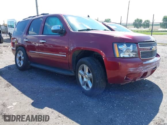 2011 Chevrolet Tahoe LTZ with VIN 1GNSKCE0XBR158736, listed as a IAAI auction lot 42355880 with 288,518 mi miles and . Bid and sale history available at DreamBid. Image 1.