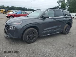 ✅ 2022 Hyundai Santa Fe XRT • VIN: 5NMS6DAJ5NH477083 • Lot: 67608615. Listed on Copart with 54,093 mi. Free auction sales archive from the USA and detailed vehicle history report at DreamBid. Image 1.
