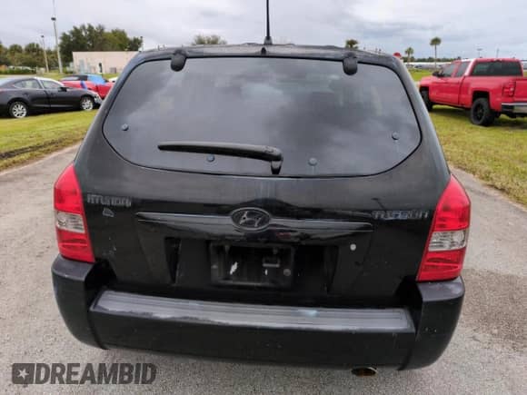 2005 Hyundai Tucson GL z VIN KM8JM12BX5U071182, wystawiony jako Copart lot #74852974 z przebiegiem 74 235 mil mil oraz Szkoda całkowita • Salvage title. Historia ofert i sprzedaży dostępna na DreamBid. Obrazek 6.