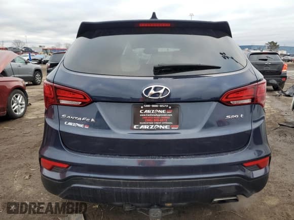 ✅ 2017 Hyundai Santa Fe 2.4L • VIN: 5XYZU3LB4HG448855 • Лот: 79426203. Опубликован ранее на Copart с пробегом 98 988 миль. Бесплатный доступ к архиву аукционных продаж из США и подробный отчёт об истории автомобиля на DreamBid. Изображение 6.