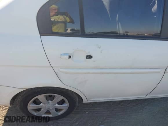 2007 Hyundai Accent GLS with VIN KMHCN46C37U089942, listed as a IAAI auction lot 43439882 with 117,698 mi miles and . Bid and sale history available at DreamBid. Image 14.