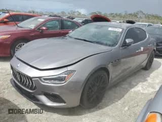 ✅ 2019 Maserati Ghibli S GranSport • VIN: ZAM57YSSXK1338528 • Лот: 76505794. Опубликован ранее на Copart с пробегом Не указан. Бесплатный доступ к архиву аукционных продаж из США и подробный отчёт об истории автомобиля на DreamBid. Изображение 1.