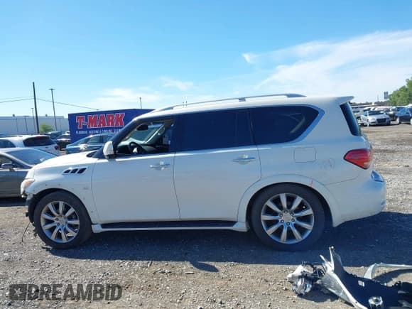 ✅ 2014 Infiniti QX80 • VIN: JN8AZ2NE9E9064040 • Lot: 43014644. Listed on IAAI with 141,766 mi. Free auction sales archive from the USA and detailed vehicle history report at DreamBid. Image 15.