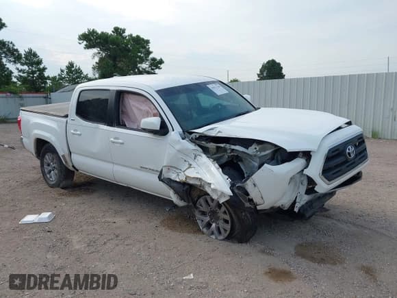 ✅ 2017 Toyota Tacoma TRD Sport • VIN: 5TFAZ5CN1HX052576 • Lot: 43012138. Listed on IAAI with 101,402 mi. Free auction sales archive from the USA and detailed vehicle history report at DreamBid. Image 1.