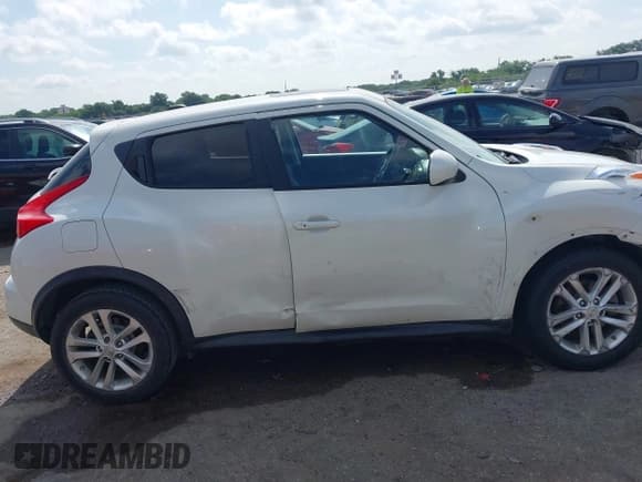 ✅ 2014 Nissan Juke SV • VIN: JN8AF5MR5ET354857 • Lot: 42567778. Listed on IAAI with 156,980 mi. Free auction sales archive from the USA and detailed vehicle history report at DreamBid. Image 13.