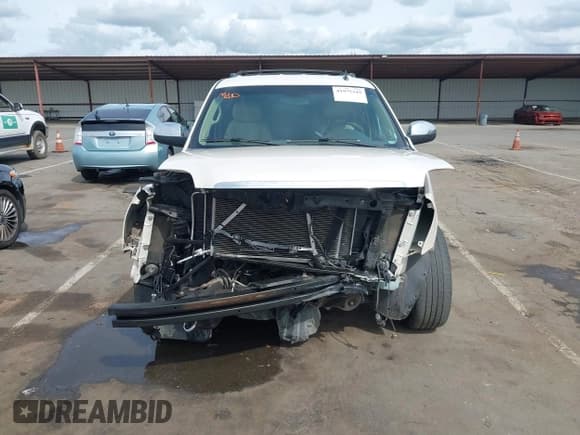 ✅ 2013 GMC Yukon XL SLT • VIN: 1GKS1KE00DR226961 • Лот: 41975349. Опубликован ранее на IAAI с пробегом Не указан. Бесплатный доступ к архиву аукционных продаж из США и подробный отчёт об истории автомобиля на DreamBid. Изображение 12.