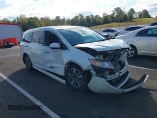 ✅ 2014 Honda Odyssey Touring • VIN: 5FNRL5H93EB043383 • Lot: 43571864. Listed on IAAI with 186,950 mi. Free auction sales archive from the USA and detailed vehicle history report at DreamBid. Image 1.