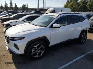 ✅ 2022 Hyundai Tucson SEL • VIN: 5NMJF3AE1NH107628 • Lot: 68881234. Wystawiony na Copart z przebiegiem 23 420 mil. Bezpłatny archiwum sprzedaży aukcyjnych z USA i szczegółowy raport historii pojazdu na DreamBid. Zdjęcie 1.