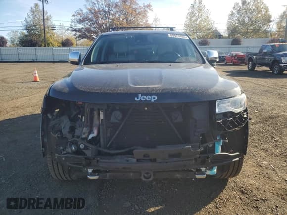 ✅ 2015 Jeep Grand Cherokee Overland • VIN: 1C4RJFCG0FC121411 • Lot: 89823465. Listed on Copart with 128,179 mi. Free auction sales archive from the USA and detailed vehicle history report at DreamBid. Image 5.