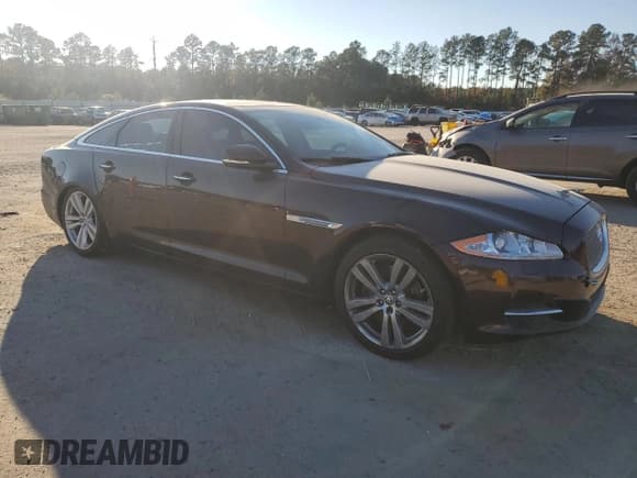 ✅ 2011 Jaguar XJ • VIN: SAJWA1CB6BLV06221 • Lot: 91406675. Listed on Copart with 106,240 mi. Free auction sales archive from the USA and detailed vehicle history report at DreamBid. Image 4.