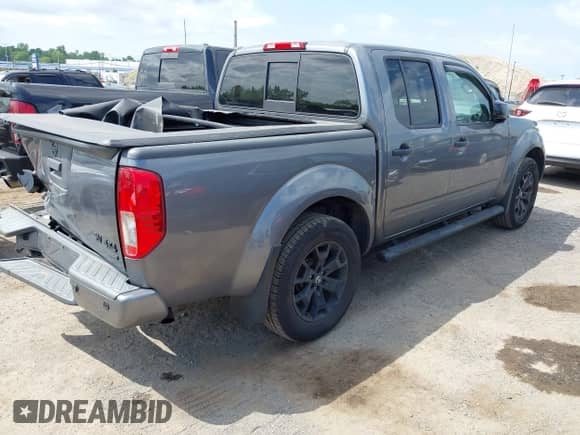 2020 Nissan Frontier SV with VIN 1N6ED0EB4LN726548, listed as a IAAI auction lot 42767637 with 64,100 mi miles and . Bid and sale history available at DreamBid. Image 4.
