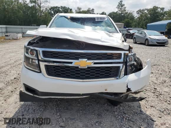 2019 Chevrolet Tahoe LS with VIN 1GNSCAKC9KR151048, listed as a Copart auction lot 69196595 with 100,702 mi miles and Salvage title. Bid and sale history available at DreamBid. Image 5.