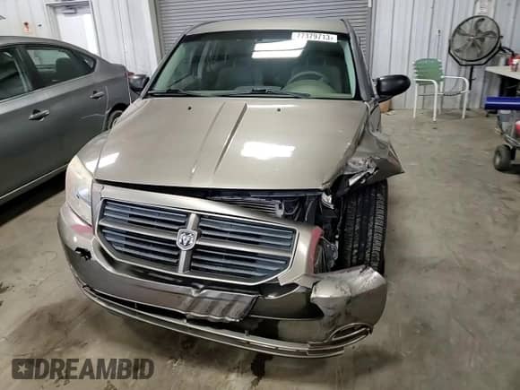 2008 Dodge Caliber SE с VIN 1B3HB28B28D696607, выставлен на аукционе Copart как лот 77379713 с пробегом 74 205 миль миль и Списание • Salvage title. История ставок и продаж доступна на DreamBid. Изображение 10.