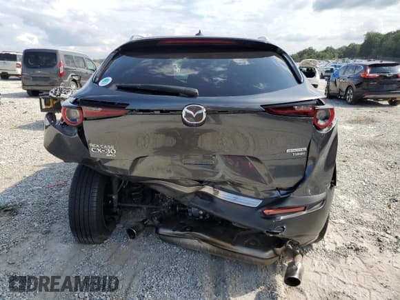 ✅ 2023 Mazda CX-30 Premium • VIN: 3MVDMBDY7PM572335 • Lot: 66309425. Wystawiony na Copart z przebiegiem 87 436 mil. Bezpłatny archiwum sprzedaży aukcyjnych z USA i szczegółowy raport historii pojazdu na DreamBid. Zdjęcie 6.