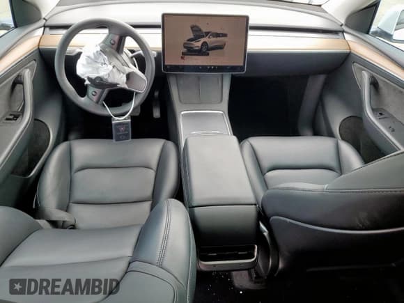 ✅ 2023 Tesla Model Y Long Range • VIN: 7SAYGAEE6PF802463 • Lot: 60727185. Listed on Copart with 62,659 mi. Free auction sales archive from the USA and detailed vehicle history report at DreamBid. Image 8.