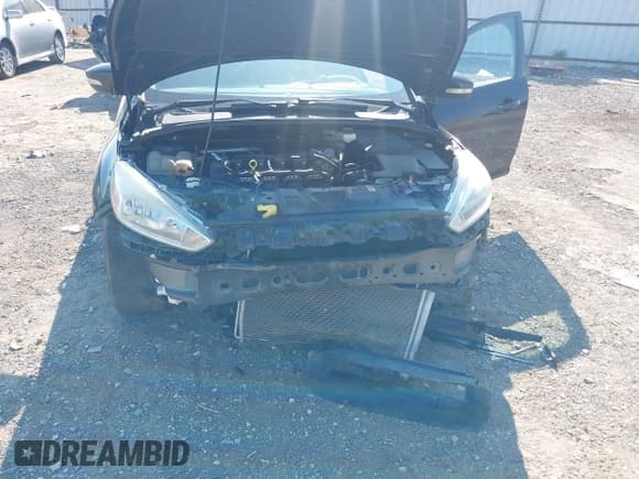 ✅ 2017 Ford Focus SE • VIN: 1FADP3K25HL246751 • Lot: 43165592. Wystawiony na IAAI z przebiegiem 99 487 mil. Bezpłatny archiwum sprzedaży aukcyjnych z USA i szczegółowy raport historii pojazdu na DreamBid. Zdjęcie 6.