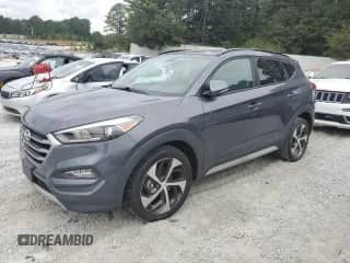 2018 Hyundai Tucson Value z VIN KM8J33A27JU804556, wystawiony jako Copart lot #84006025 z przebiegiem 90 520 mil mil oraz Czysty tytuł • Clean title. Historia ofert i sprzedaży dostępna na DreamBid. Obrazek 1.