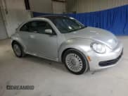 ✅ 2014 Volkswagen Beetle 2.5L • VIN: 3VWJX7ATXEM614430 • Lot: 92179165. Wystawiony na Copart z przebiegiem 169 965 mil. Bezpłatny archiwum sprzedaży aukcyjnych z USA i szczegółowy raport historii pojazdu na DreamBid. Zdjęcie 4.