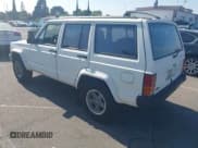 ✅ 1996 Jeep Cherokee Sport • VIN: 1J4FT68S7TL265733 • Lot: 42499228. Listed on IAAI with 230,001 mi. Free auction sales archive from the USA and detailed vehicle history report at DreamBid. Image 3.