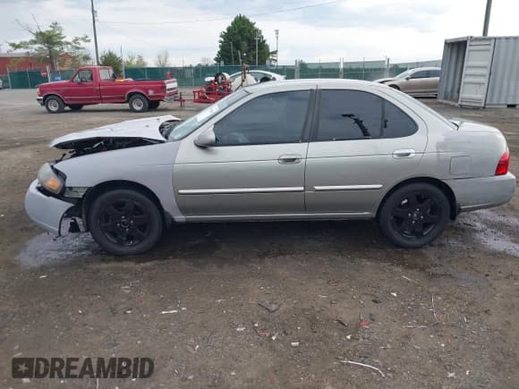 ✅ 2005 Nissan Sentra S • VIN: 3N1CB51D15L456110 • Lot: 41951448. Wystawiony na IAAI z przebiegiem 106 755 mil. Bezpłatny archiwum sprzedaży aukcyjnych z USA i szczegółowy raport historii pojazdu na DreamBid. Zdjęcie 14.